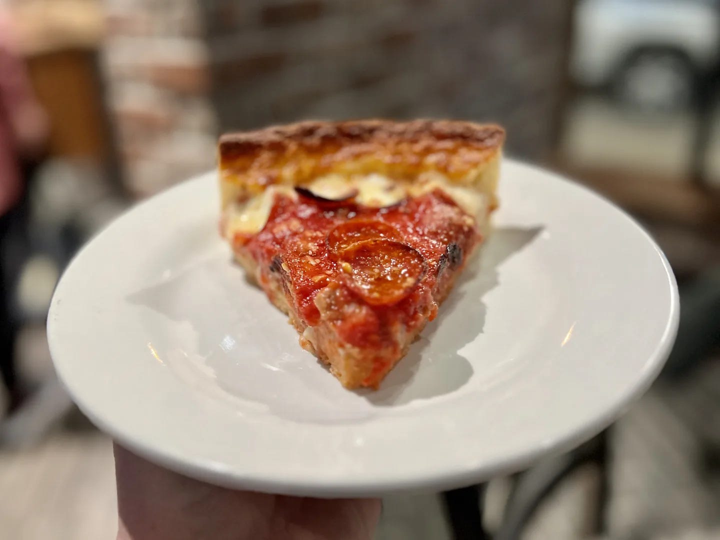 Slice of deep dish pizza Slice of deep dish pizza