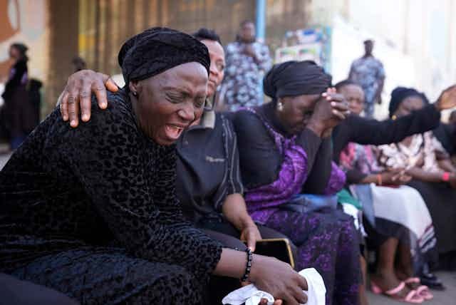 Women in Nigeria cry over attacks on civilians. Women in Nigeria cry over attacks on civilians.