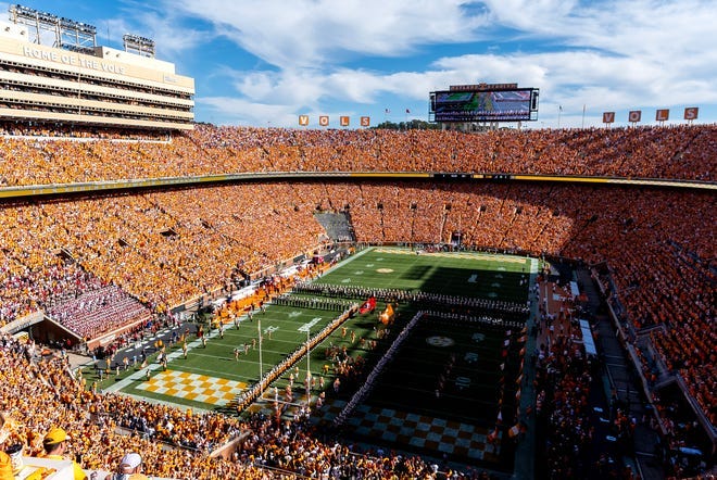The Tennessee football team runs through the T before the start of an SEC conference game between UT and Alabama in Neyland Stadium on Saturday, Oct. 19, 2024.