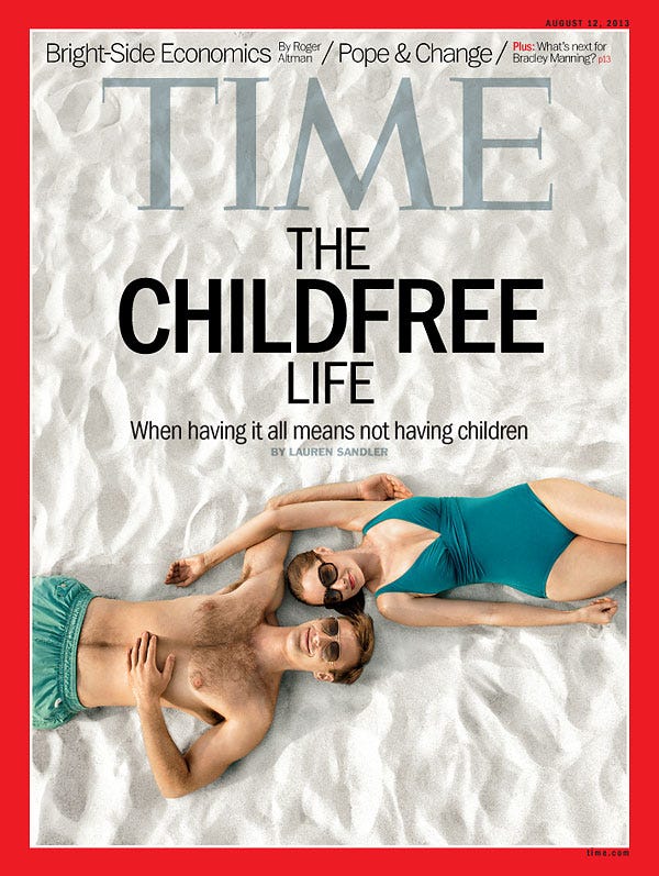 A photograph of a couple on the beach