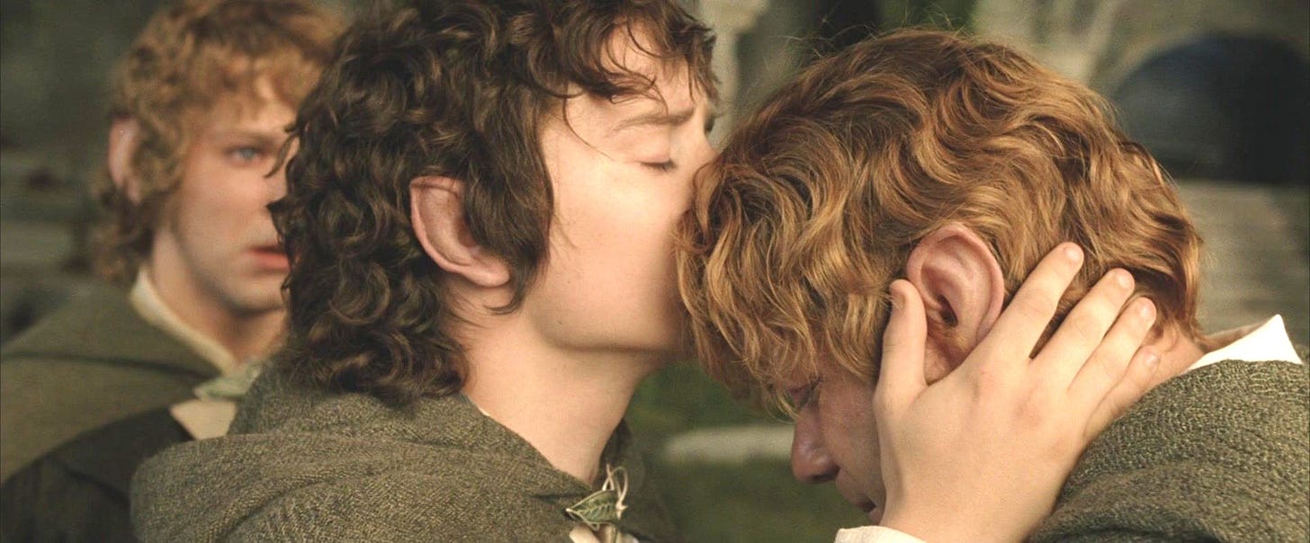 Frodo kisses Sam's head