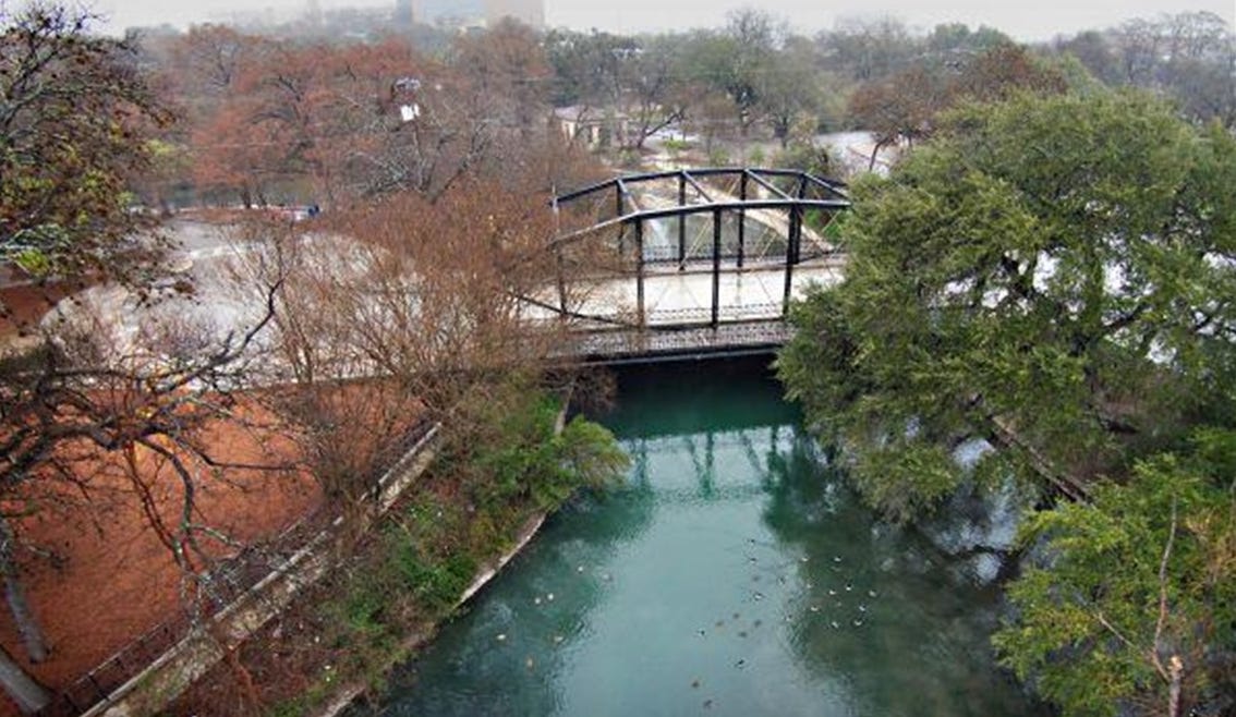 Bridge over a river in city park Bridge over a river in city park