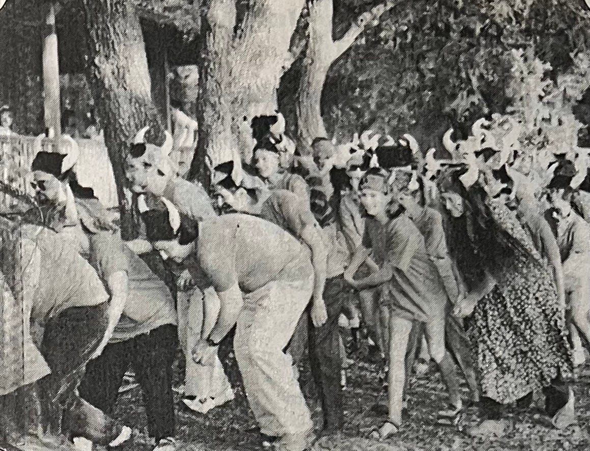 A group of people wearing horns

Description automatically generated with medium confidence