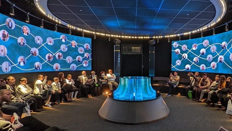 Students sitting in a conference centre