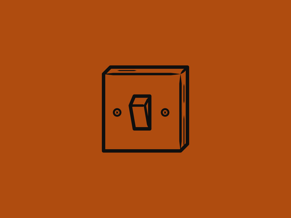 orange background with a light switch in the middle orange background with a light switch in the middle