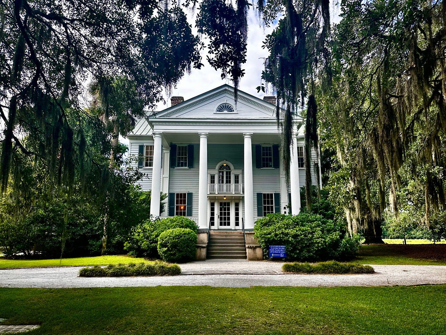 The original back of the house that the McLeods switched to be the front with the addition of large Corinthian pillars and the porch to invite plantation tourism in the 1930s. Author photograph (June 2026). 