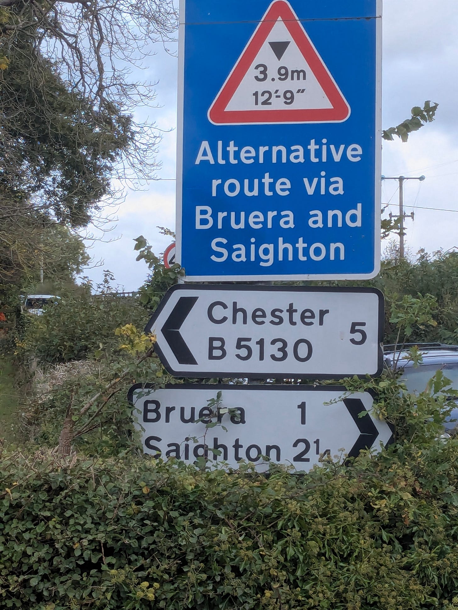 A road sign showing that Chester is 5 miles away. A road sign showing that Chester is 5 miles away.