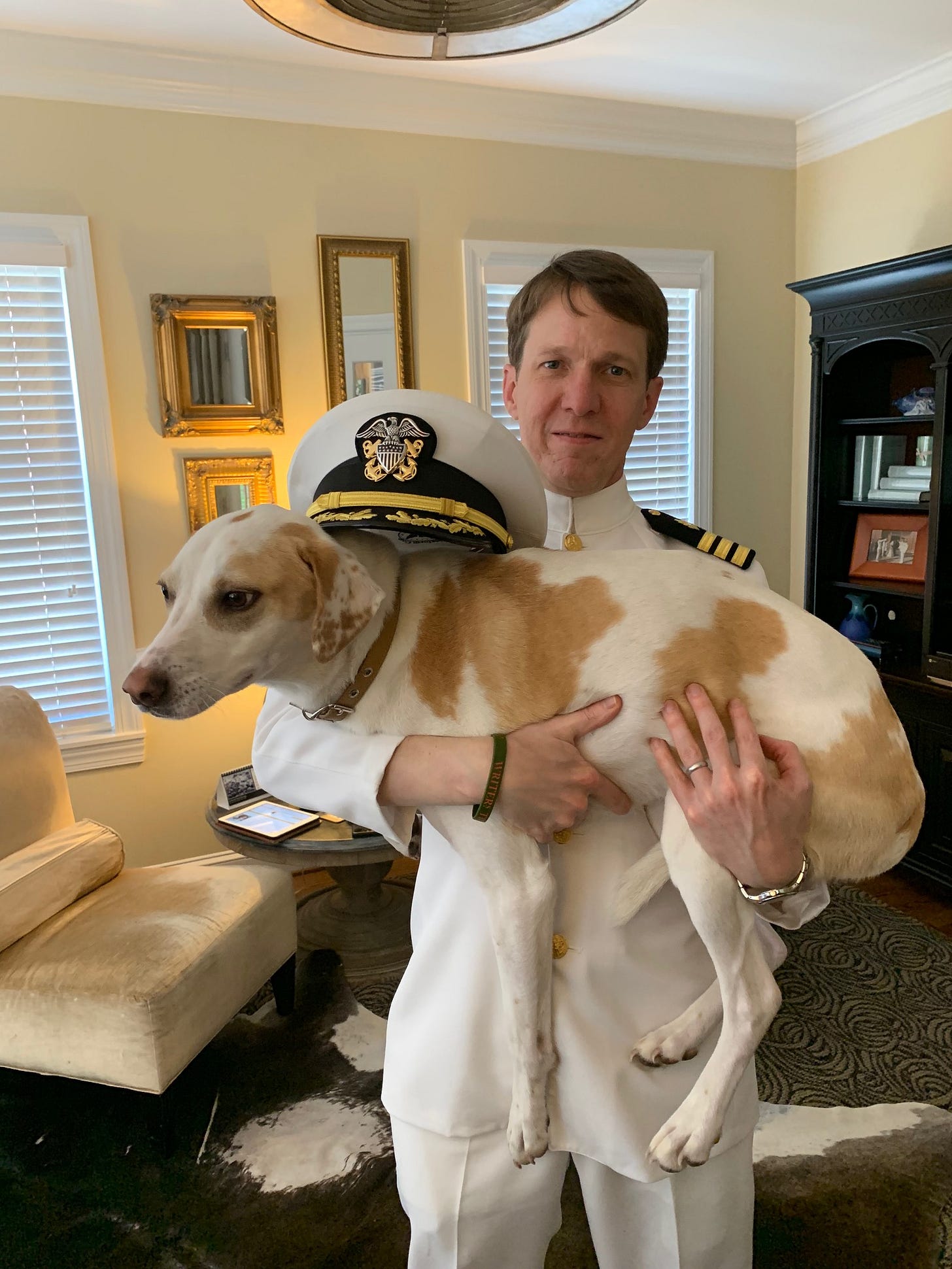 Russell Carr in uniform with his dog Riley Russell Carr in uniform with his dog Riley