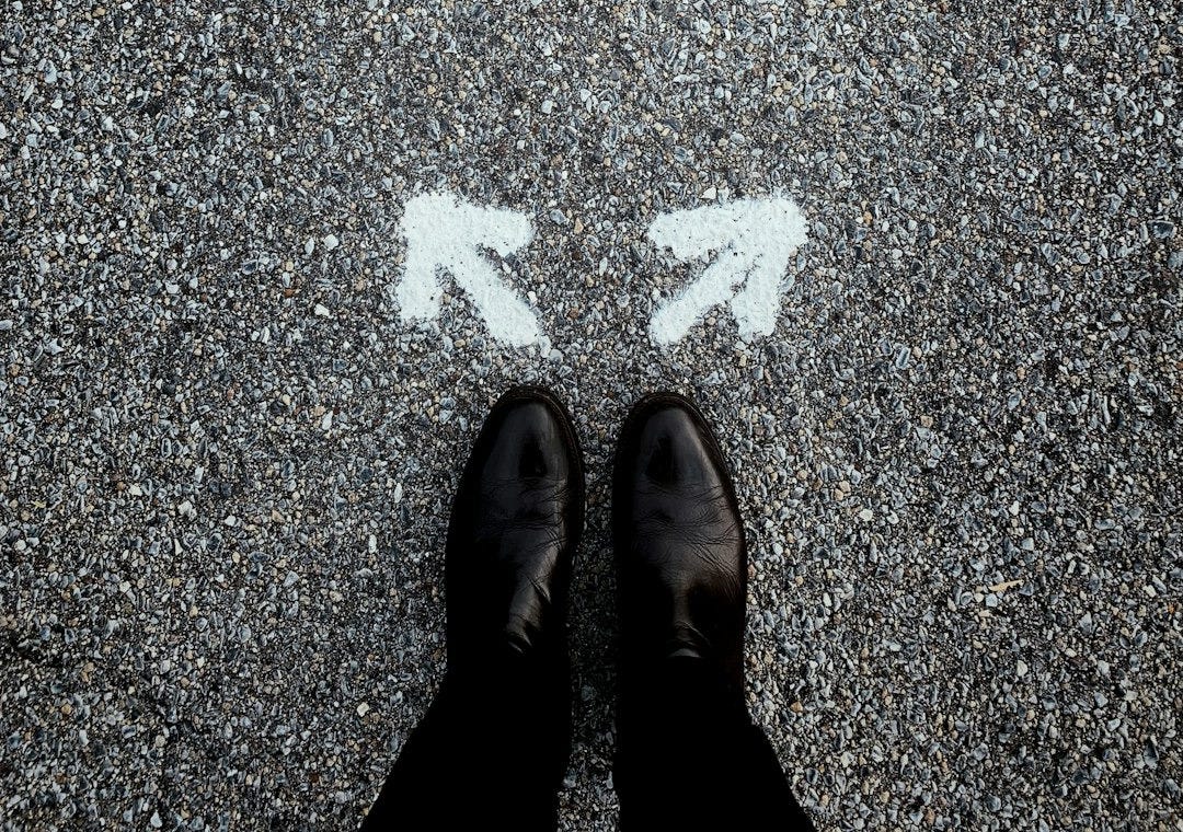 a person standing in the middle of a street