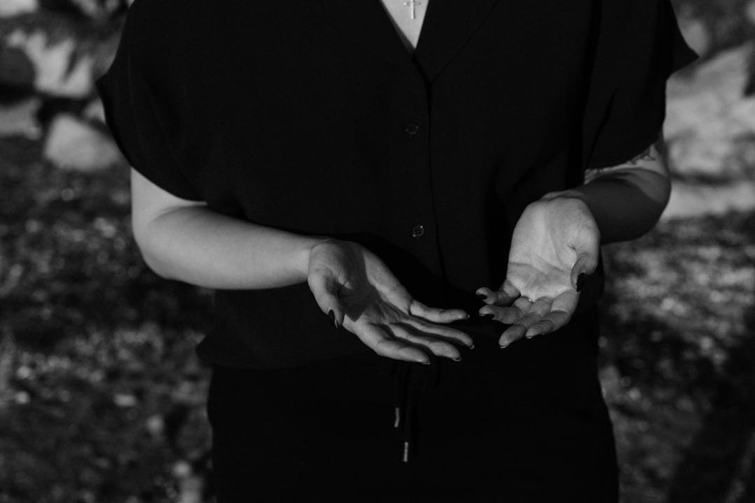 person in black button up shirt