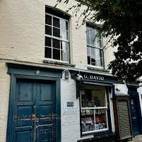 The Cupboard Where We Keep the World logo