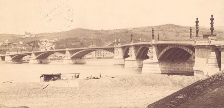 A bridge over a river

AI-generated content may be incorrect.