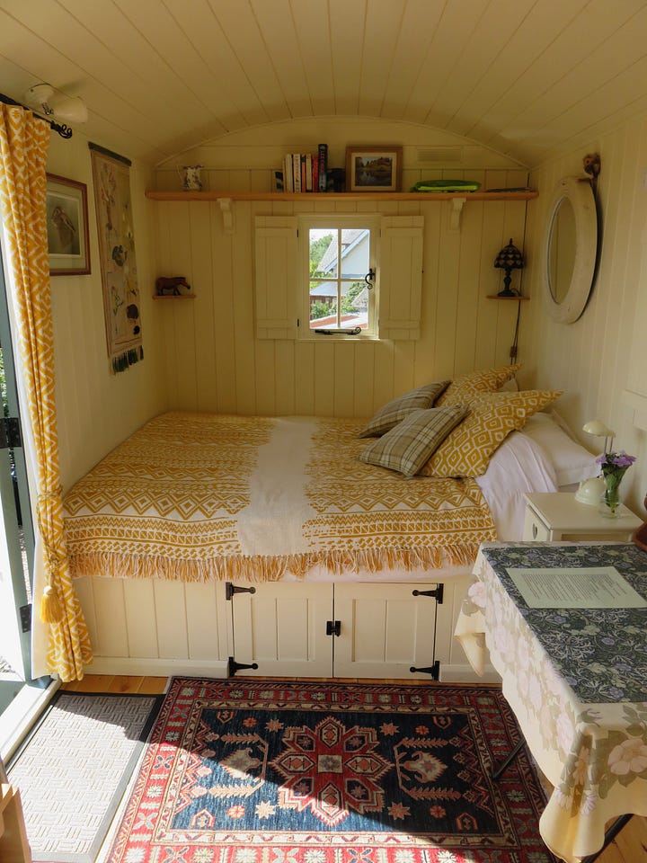 interior of the shepherds hut including the living space and bedroom