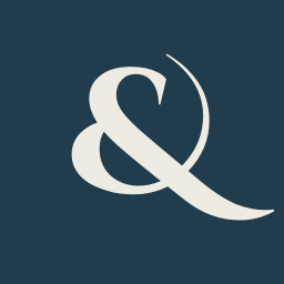 Living in the & logo