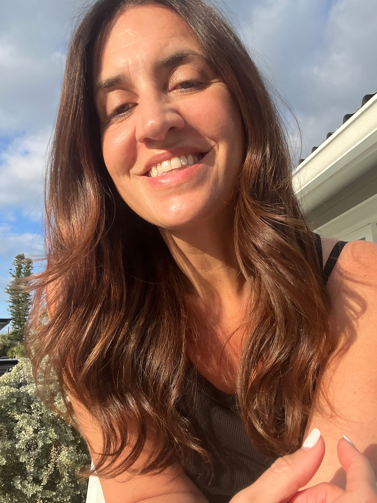A sunny picture of Donna Francis, Beauty Editor in Florida for an article about her skincare routine
