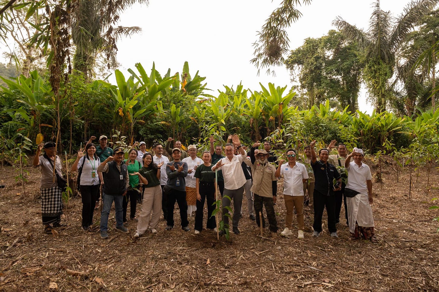 Community representatives and conservation partners participate in a tree-planting initiative near Pura Luhur Batukaru in Bali, supporting forest restoration and watershed protection through a year-long maintenance programme. Community representatives and conservation partners participate in a tree-planting initiative near Pura Luhur Batukaru in Bali, supporting forest restoration and watershed protection through a year-long maintenance programme.