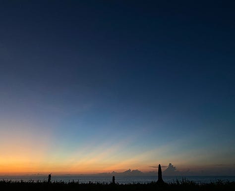 photos of sunsets and beach scenes after dark in Holbox, Mexico. The nighttime beach scenes appear to have been taken during the daytime, but because of the phone camera's ability to regulate light, the photos look like they were taken during the day. 