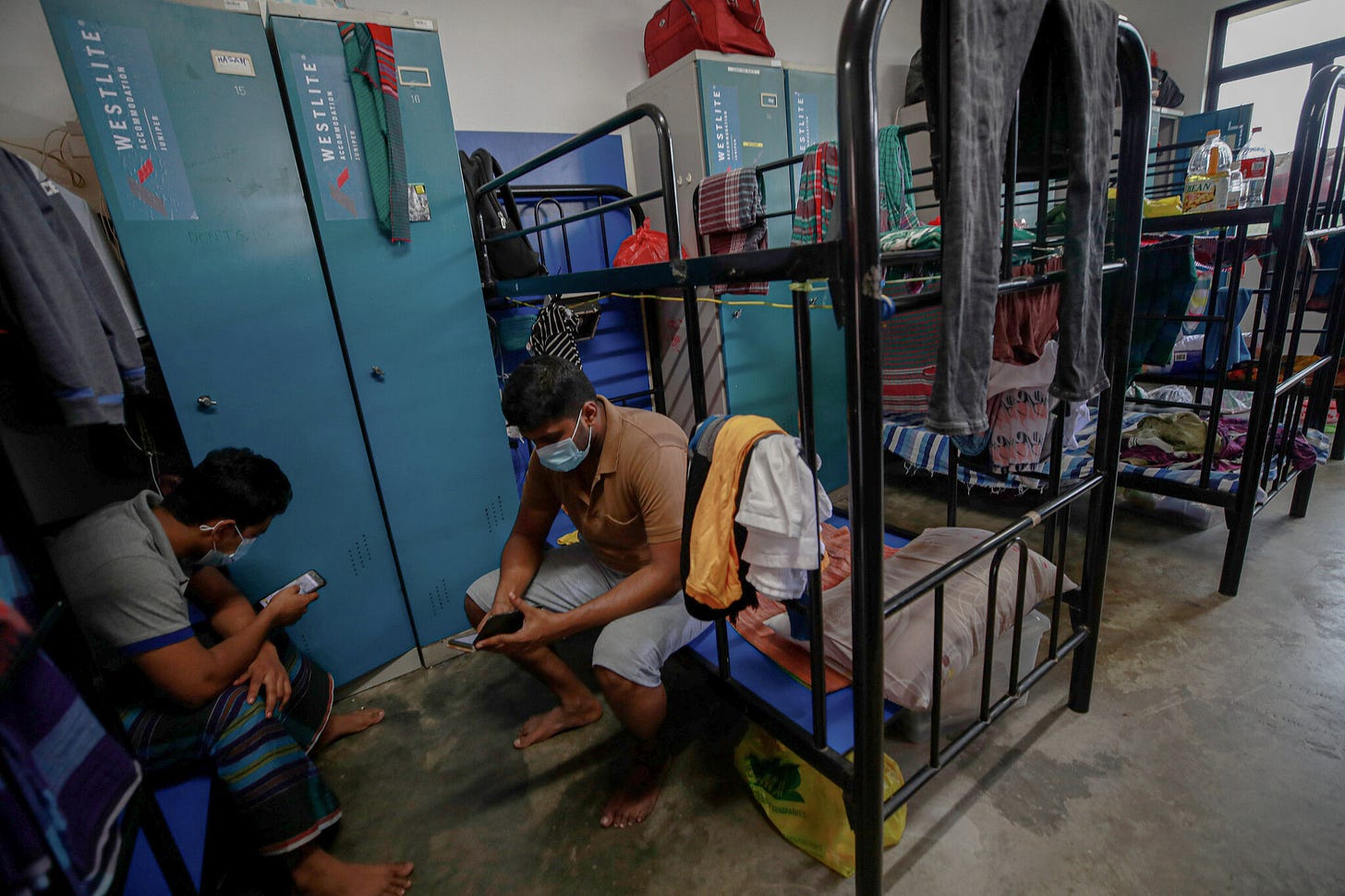 In lockdown for 18 months, Singapore's migrant workers yearn for freedom. -  The New York Times