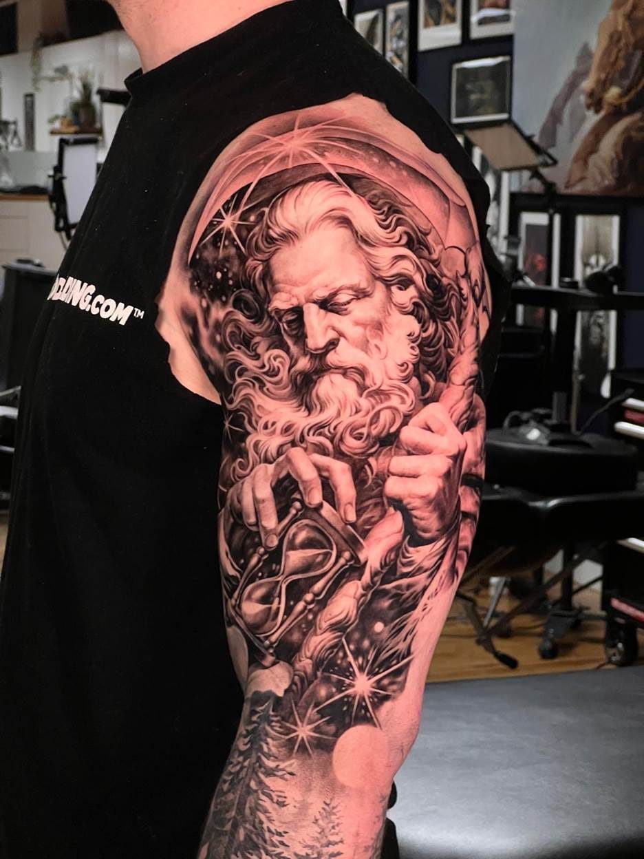 A person wearing a black shirt with a tattoo on his arm
AI-generated content may be incorrect. A person wearing a black shirt with a tattoo on his arm
AI-generated content may be incorrect.