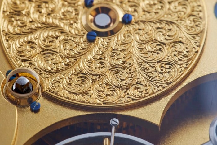 The decorated barrel with a classic English scroll pattern on Pocket Watch No. 2. Photo by Atom Moore. The decorated barrel with a classic English scroll pattern on Pocket Watch No. 2. Photo by Atom Moore.