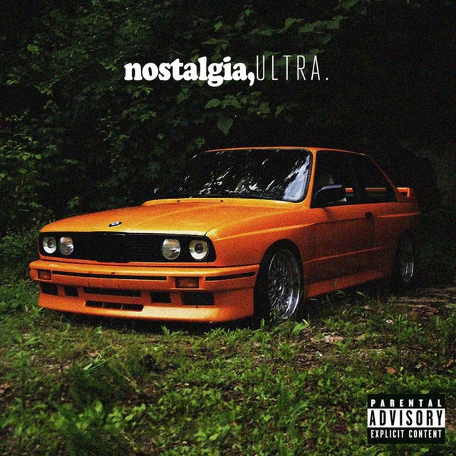the album art for nostalgia, ULTRA by Frank Ocean, featuring an orange BMW E30 sitting in the grass. the album art for nostalgia, ULTRA by Frank Ocean, featuring an orange BMW E30 sitting in the grass.