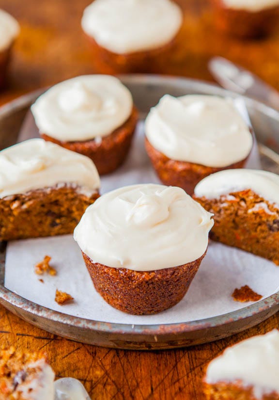 Carrot Cake Cupcakes topped with cream cheese frosting. 