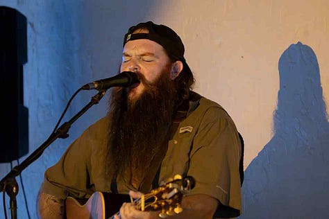 Clint Vines, Colton Sanders, and Jay Burnam perform in the loft at Iron Society, July 25th, 2025