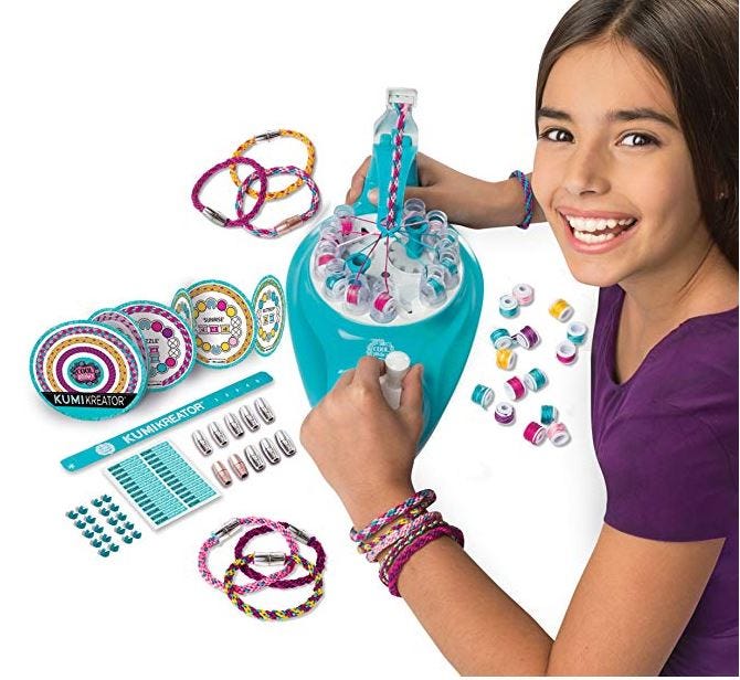 Cool Maker Bracelet Maker young girl making jewelry Cool Maker Bracelet Maker young girl making jewelry
