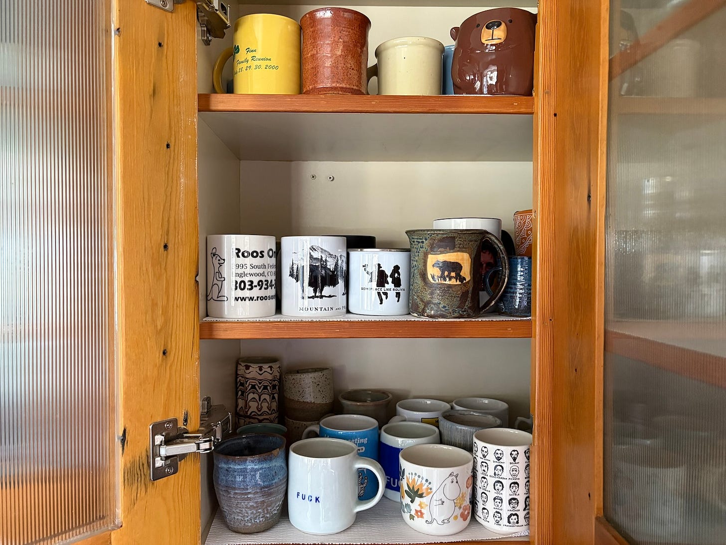 cabinet of coffee mugs