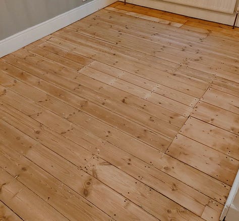 Various pictures showing various states of repairs from plugs being pulled out of the wall, to a wallpaper stripped wall with cracks, to.wall cracks being filled, to two freshly sanded floors and wall painted white