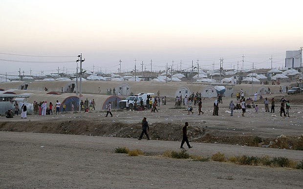 Displaced Iraqis from the Yazidi community near the Syria-Iraq border. Photo: AP