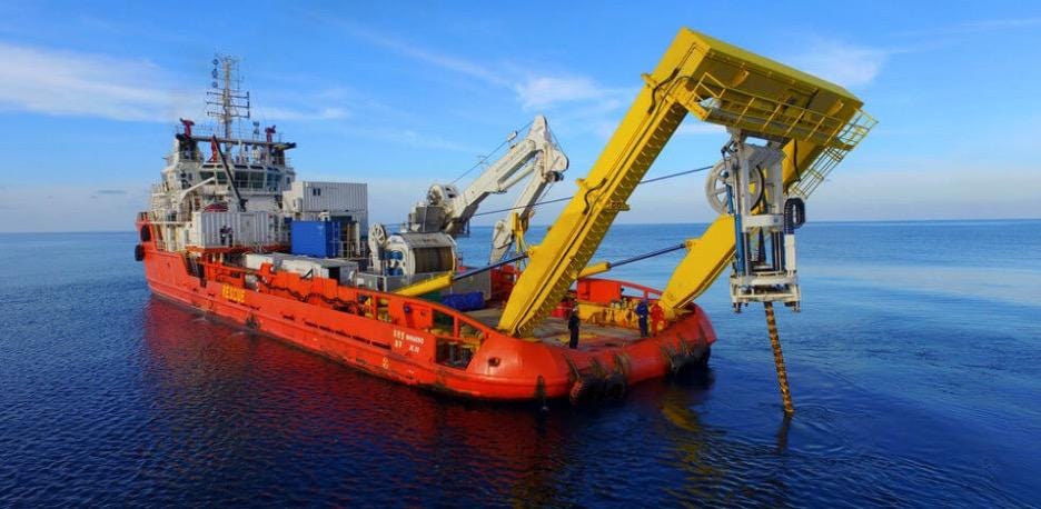Cable-laying ship in the ocean Cable-laying ship in the ocean