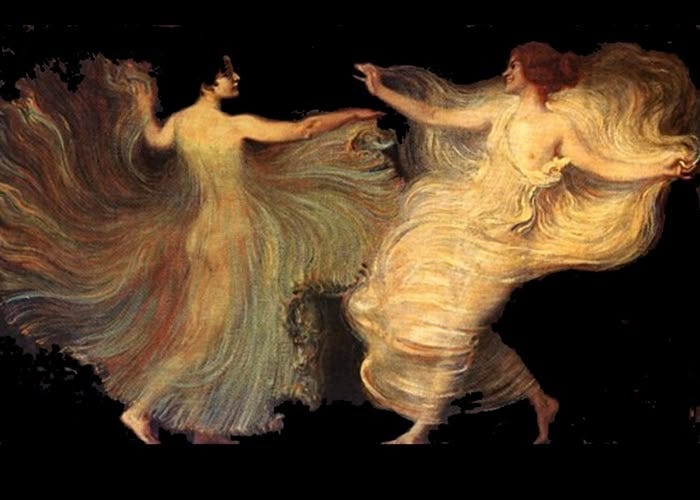 This may contain: two women dressed in long dresses are dancing