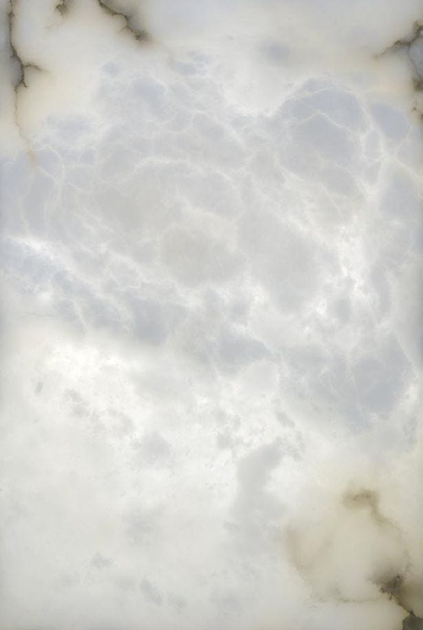 This may contain: an airplane flying in the sky with clouds