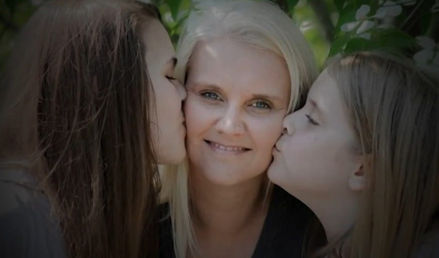 Crystal Rogers (center) and two of her daughters. Crystal Rogers (center) and two of her daughters.