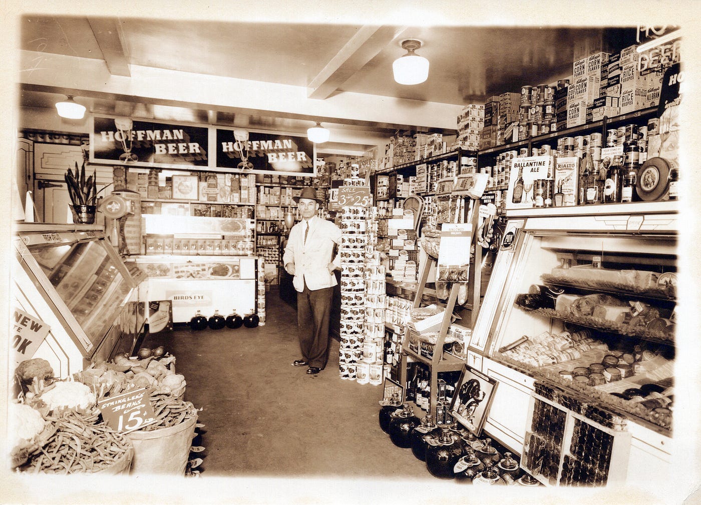 Photo of a man standing in a grocery store