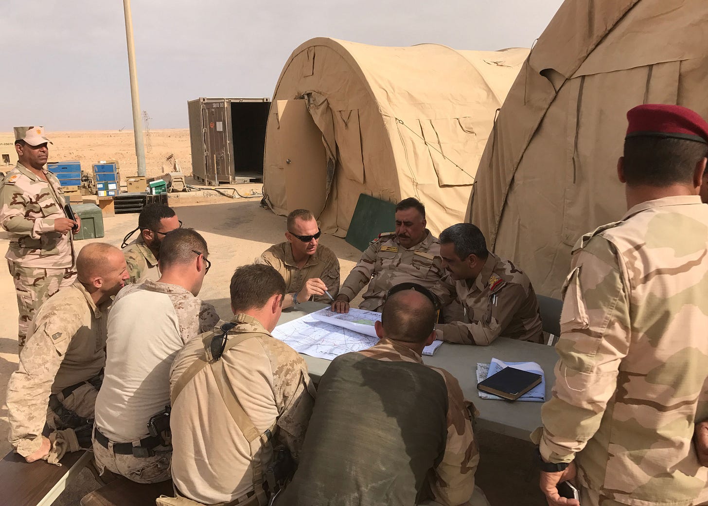 Staff Maj Gen Qassim and Task Force Lion advisors review plans at Al Qa’im ahead of the Iraqi Security Forces’ phase three clearance operation.