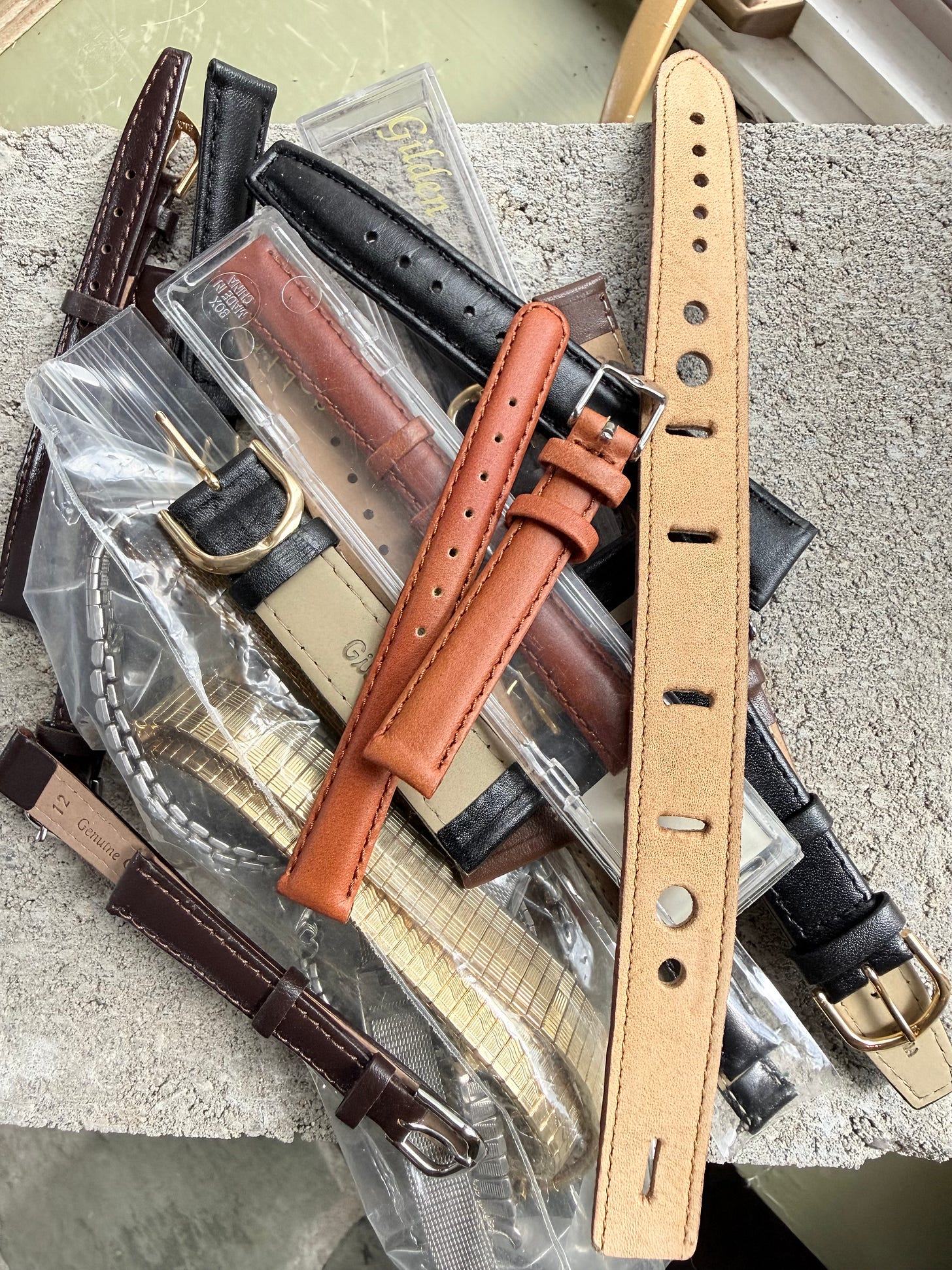 watch straps on a cinder block watch straps on a cinder block