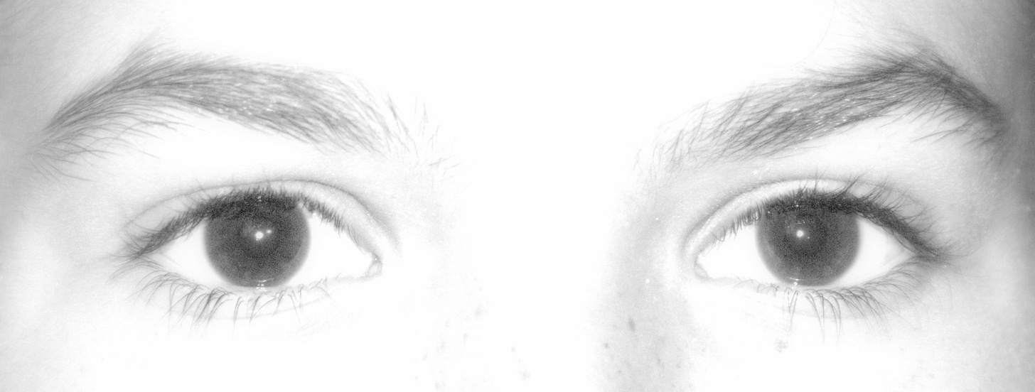 Grey-scale photo of eyes of a young woman. My photo.