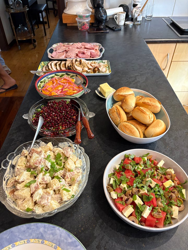 Christmas food and woman making a pavlova