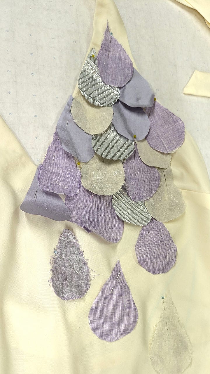 Close ups of the dress scales in progress