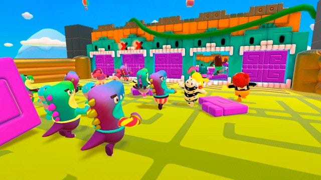 partida de fall guys com jogadores fantasiados de dinossauro