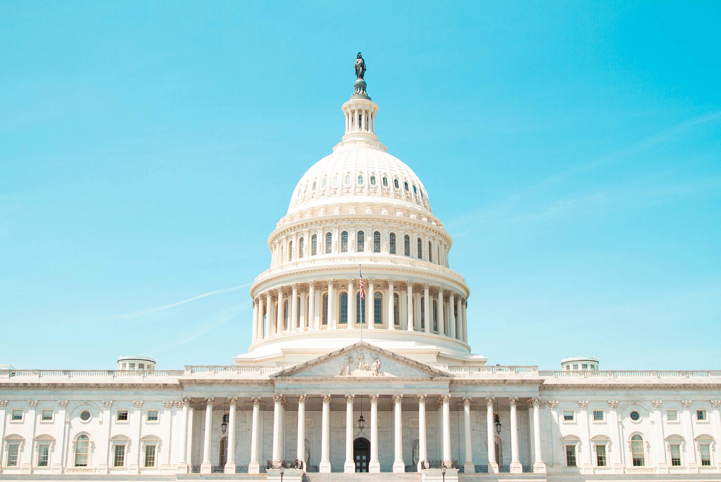 Image of the U.S. Capitol Building with a blue sky