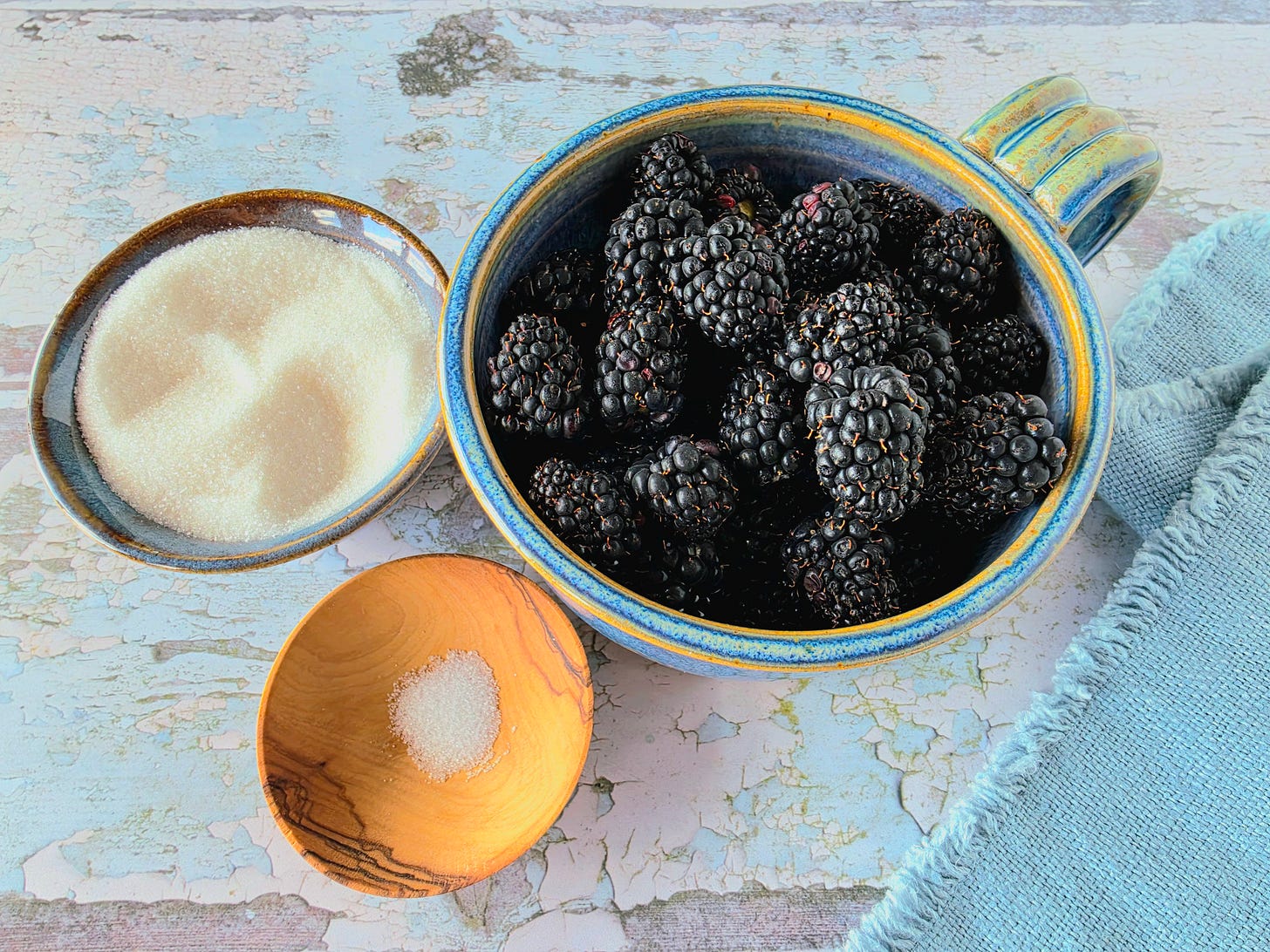 bowls of ingredients for the blackberry coulis