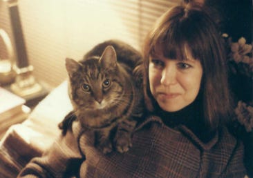 Younger me, with Pushkin the cat, companion in life and memory. Younger me, with Pushkin the cat, companion in life and memory.