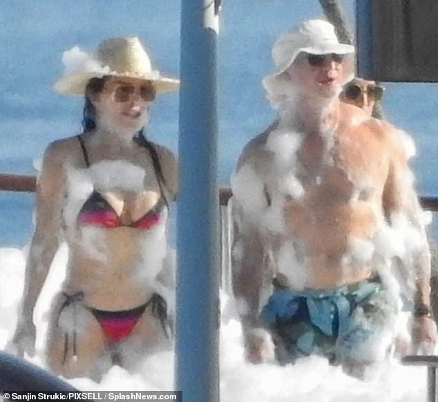 Bezos and Sanchez nuptials has already attracted huge controversy with protests planned by locals angry at the couple for 'taking over the city' for the planned three day festivities. Pictured: Jeff Bezos And Lauren Sanchez at a foam party on Bezos' yacht ahead of the event