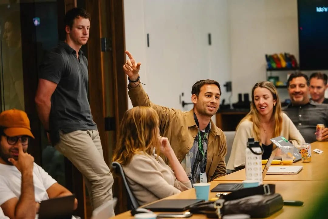 Taylor Offer working alongside fellow founders in the a16z Speedrun cohort during an in-person workshop focused on rapid execution, GTM tactics, and AI-driven product iteration.