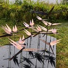 Shimmering sculpture lands at wetland centre