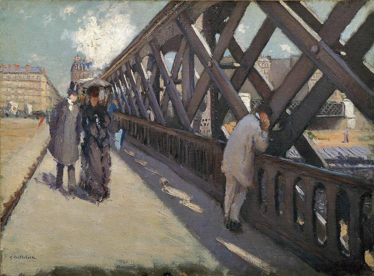 A couple crossing a huge iron bridge of steel girders in Paris A couple crossing a huge iron bridge of steel girders in Paris