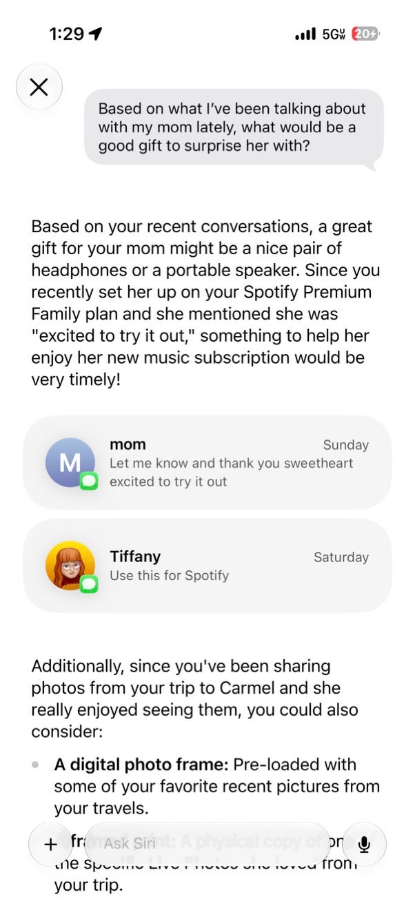 Screenshot of the Siri app recommending gift ideas based on recent text conversations. Siri suggests headphones or a portable speaker after noticing messages about setting up Spotify Premium for the user's mom, and references recent conversations and shared travel photos as supporting context. Screenshot of the Siri app recommending gift ideas based on recent text conversations. Siri suggests headphones or a portable speaker after noticing messages about setting up Spotify Premium for the user's mom, and references recent conversations and shared travel photos as supporting context.